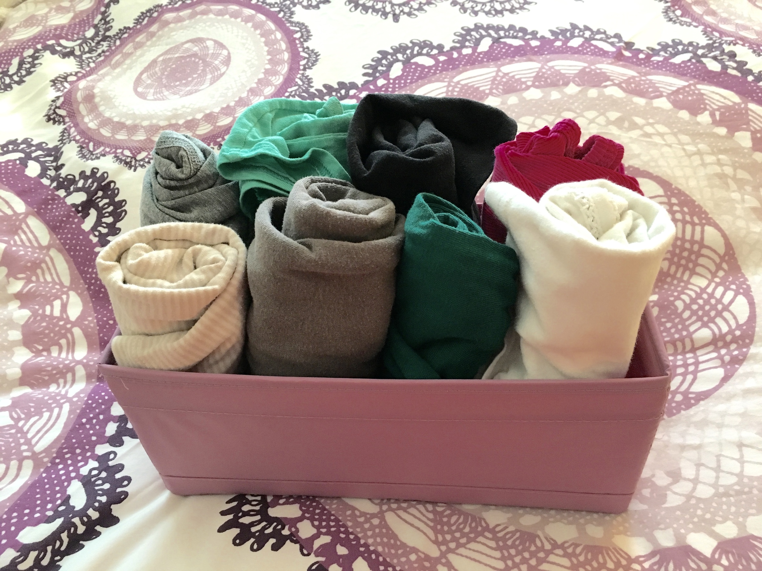 For years I used shoe boxes (or even the box my garbage bags came in). So staying frugal is totally possible! But if you want to upgrade, you can get drawer dividers like these from IKEA (I think it's a combo pack of 4 for $8ish) or The Container Store has a ton of pretty options!