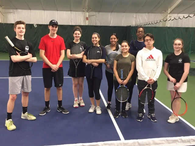 First Serve Bridgeport 18-under team poses during their indoor practice.