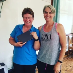 Marie Harris receiving her tablet from her Active Farmers trainer Kim Broomby
