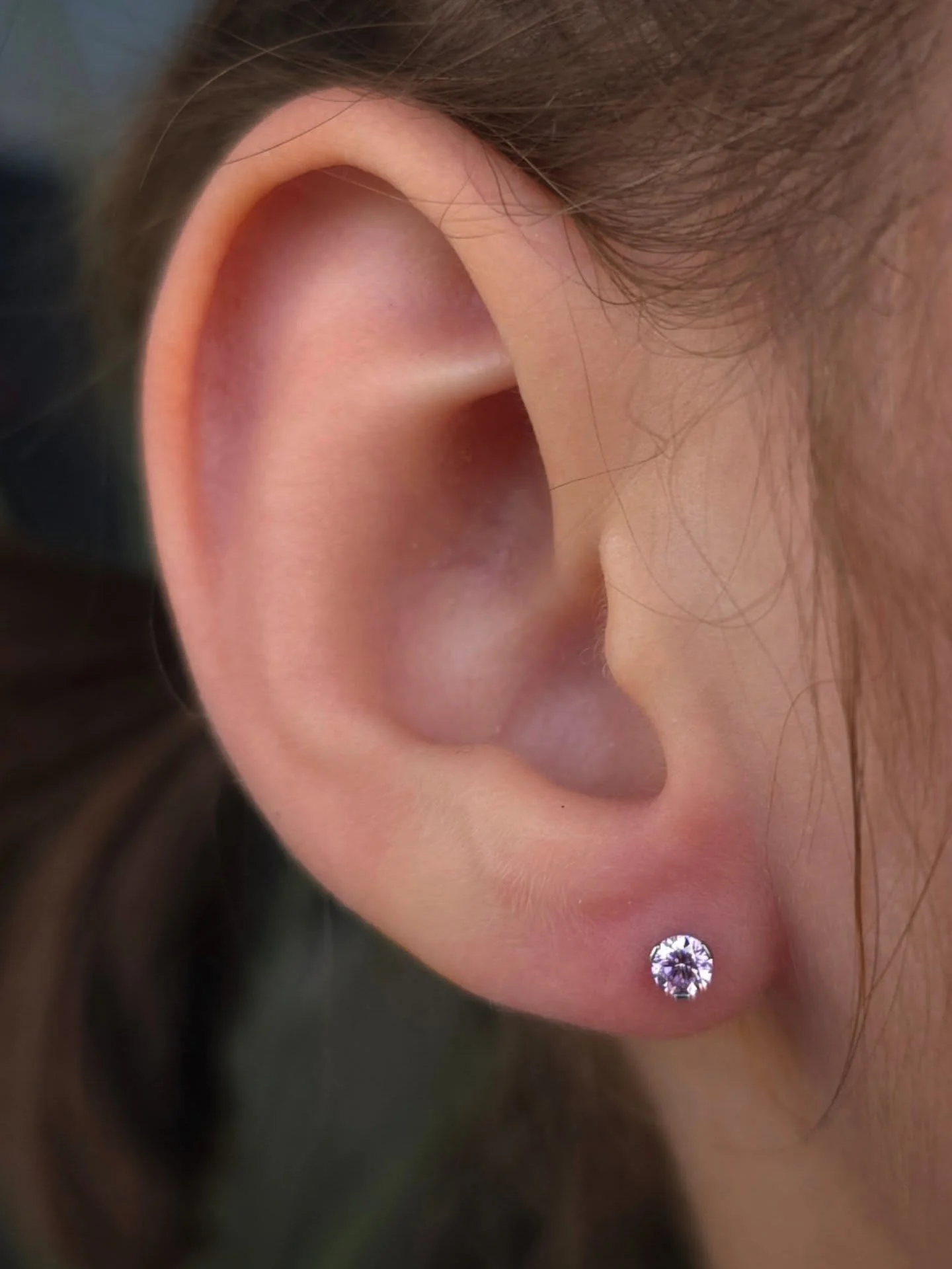 Did you know we pierce kids as young as 3?
We require a consultation beforehand to determine if they're ready, but typically they do really great!
This 4 year old cutie and her moms came in for their appointment, picked out these super cute pink ea