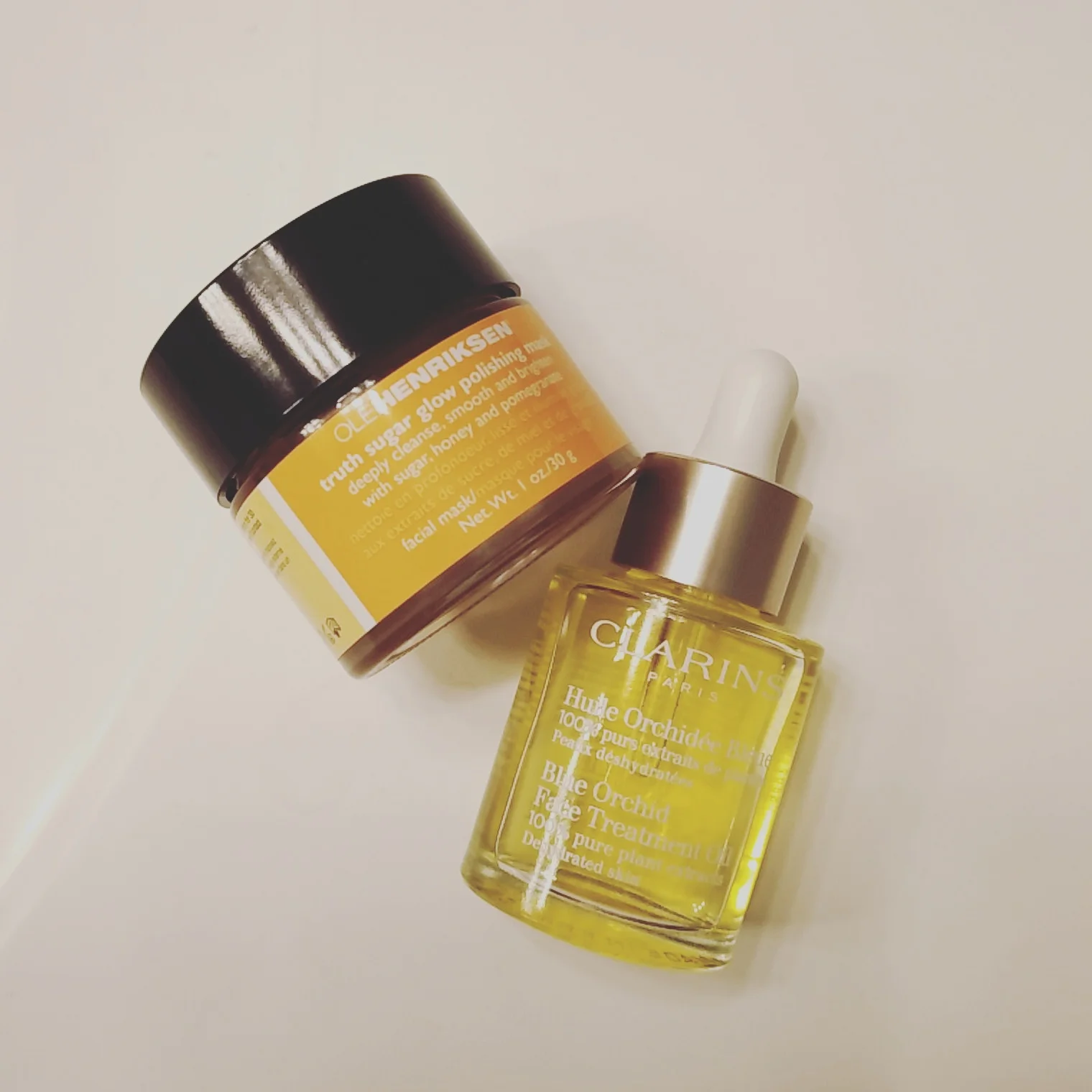 Ole Henriksen - Truth Sugar Glow Polishing Mask (Left), and Clarins - Blue Orchid Face Treatment