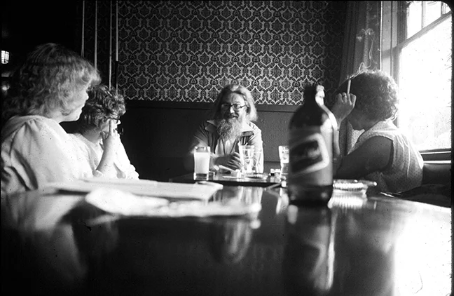 Writer Robin Skelton (1925 - 1997) at the Jack of Clubs Hotel with IMA students circa late 70s/early 80s