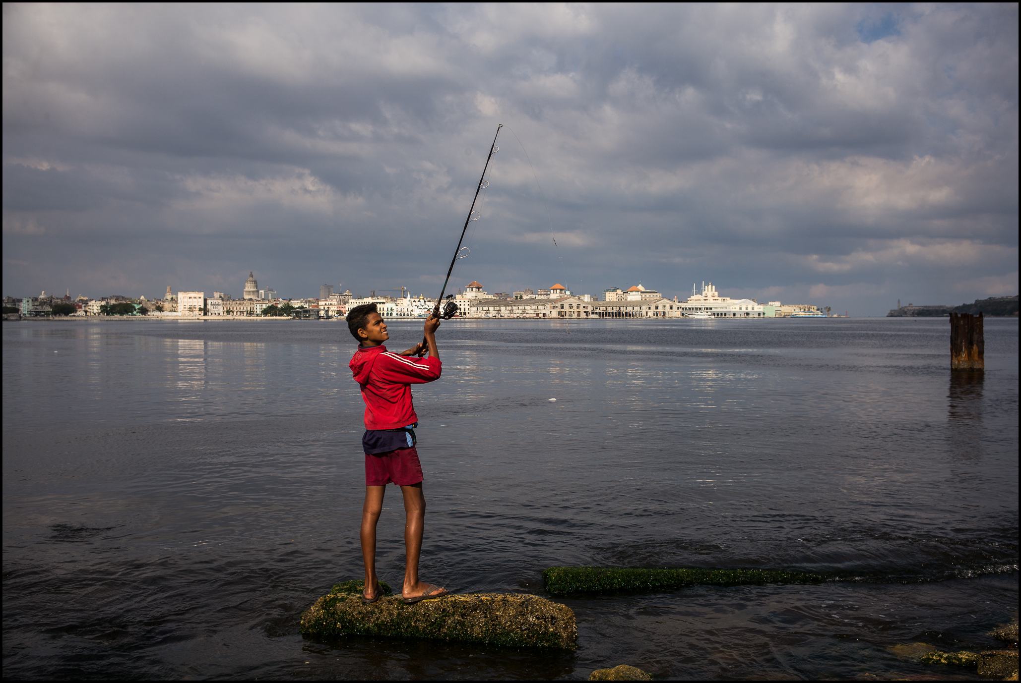 Boy Fishing, Regla