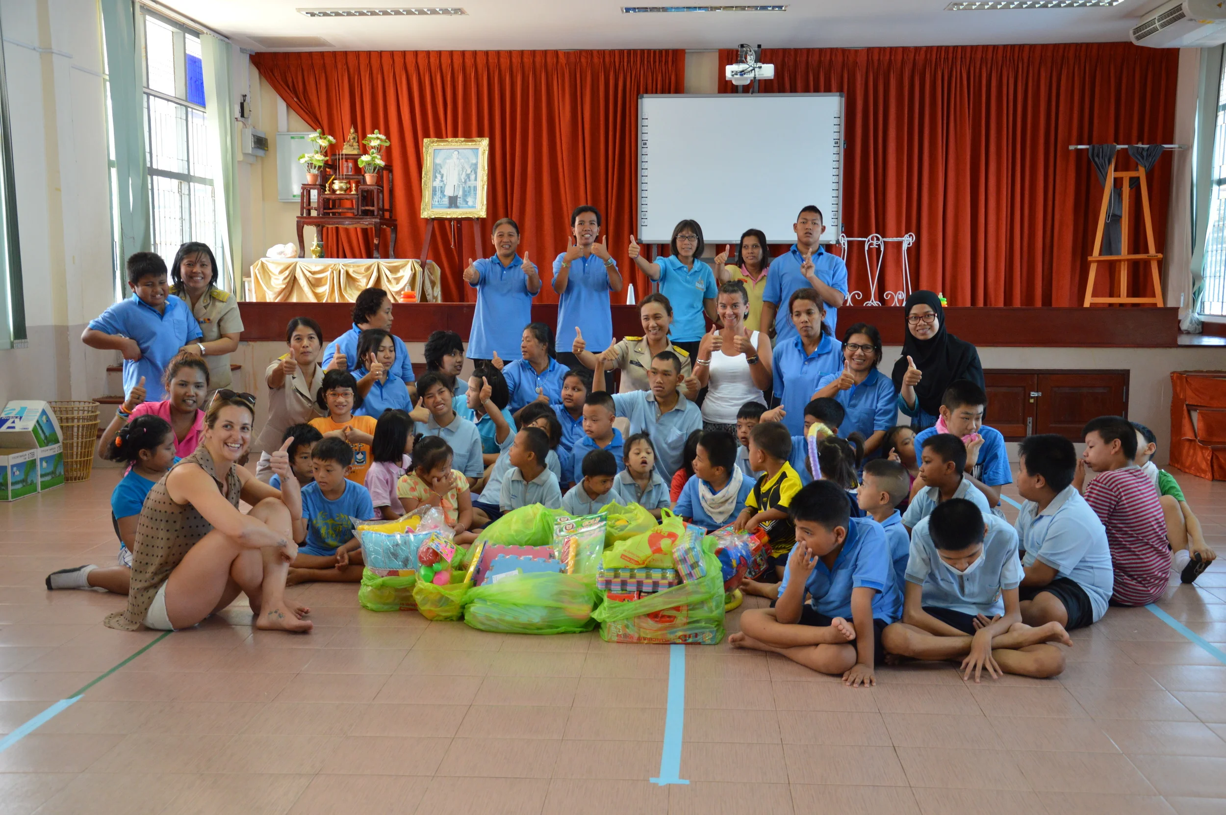 Donna and Phoebe with the kids at the Phuket Special Education Centre receiving toys, pillows and food from EATSS