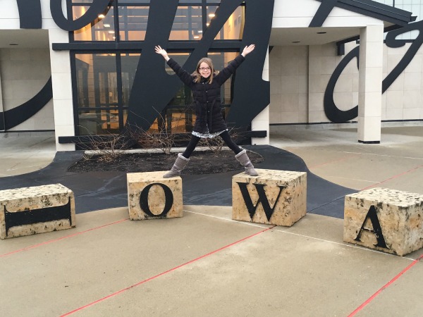 Rest stop along the way where Tess is showing her state pride. Gosh, I love this girl.