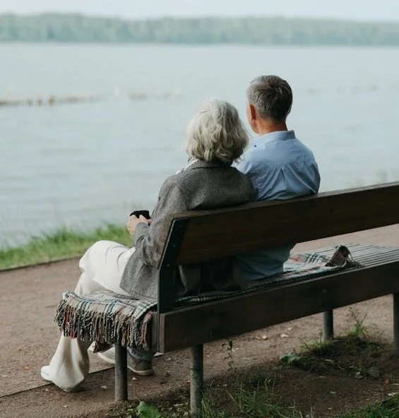 An older couple on a bench