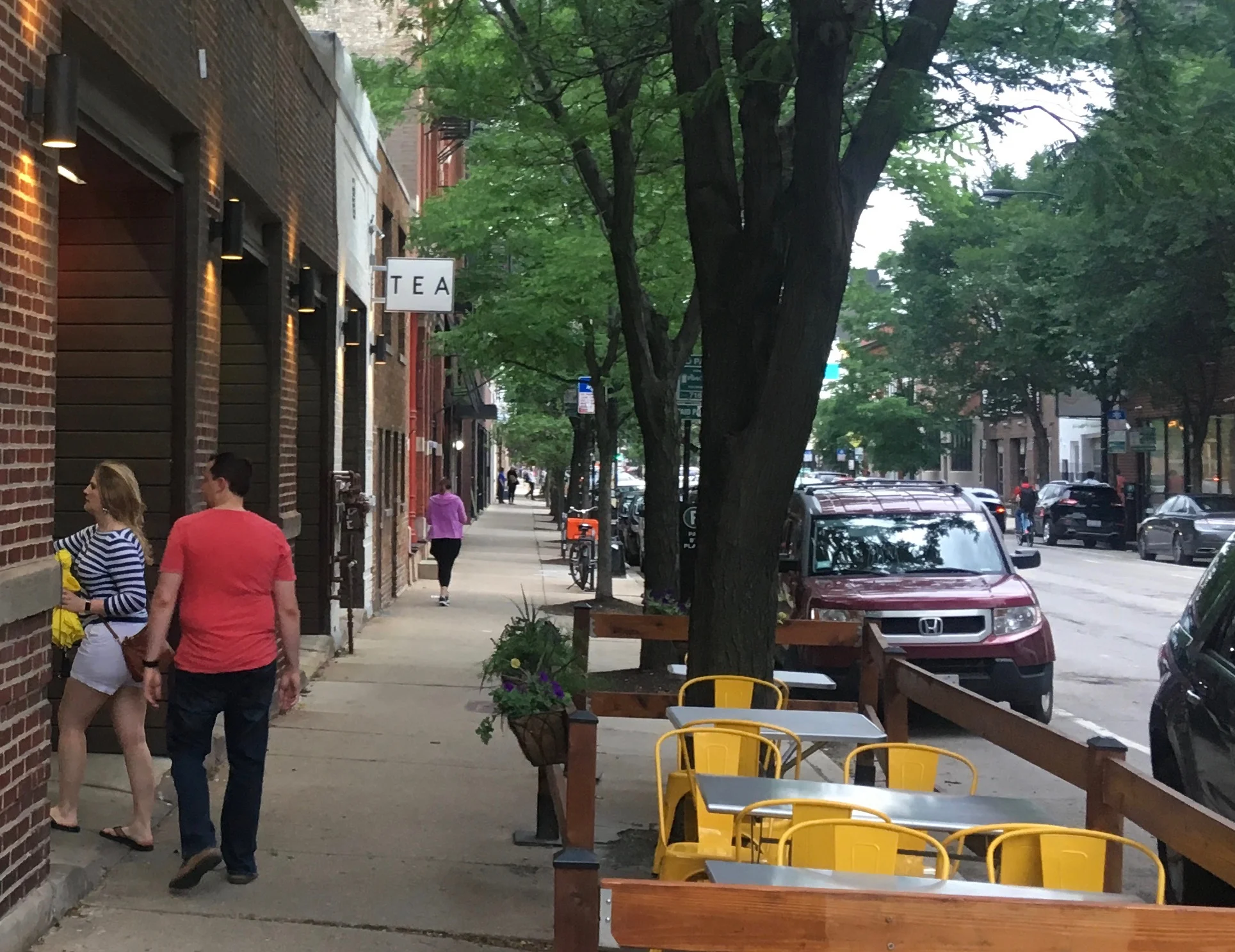 Xuan Tea in Bucktown has a permitted blade sign, and the required Public Way Use Permit (Grant of Privilege) because it hangs over the public way. Photo by Steven Vance.