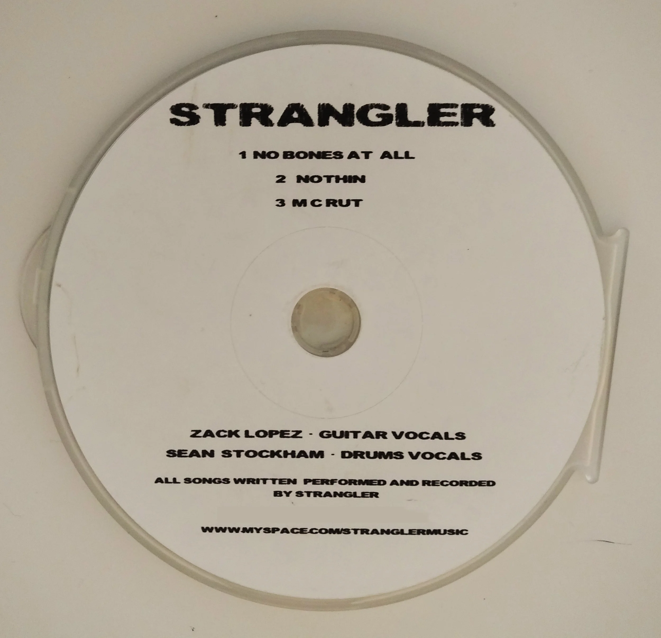 STRANGLER_LABEL FACE.jpg