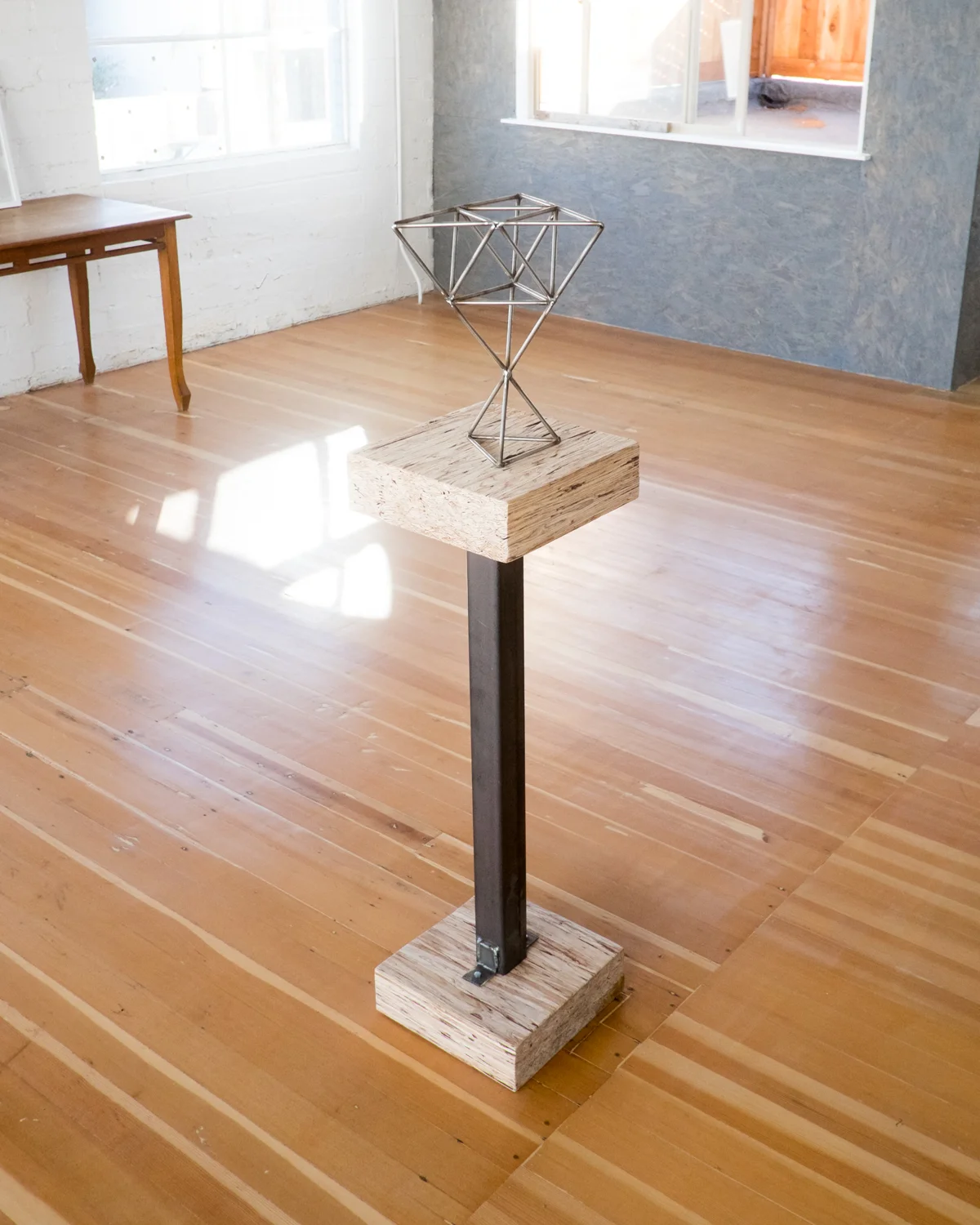 Metal work and pedestal by Cody