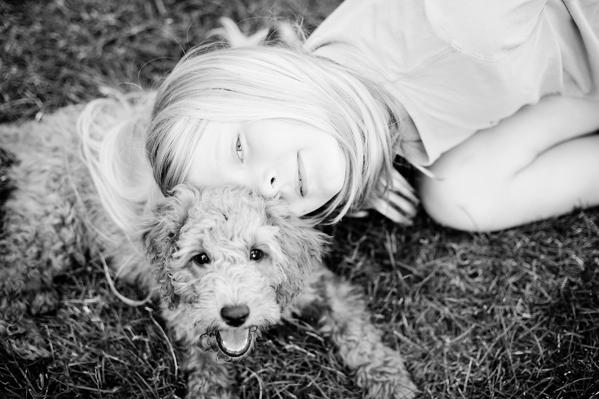 Young Girl with Puppy Dog