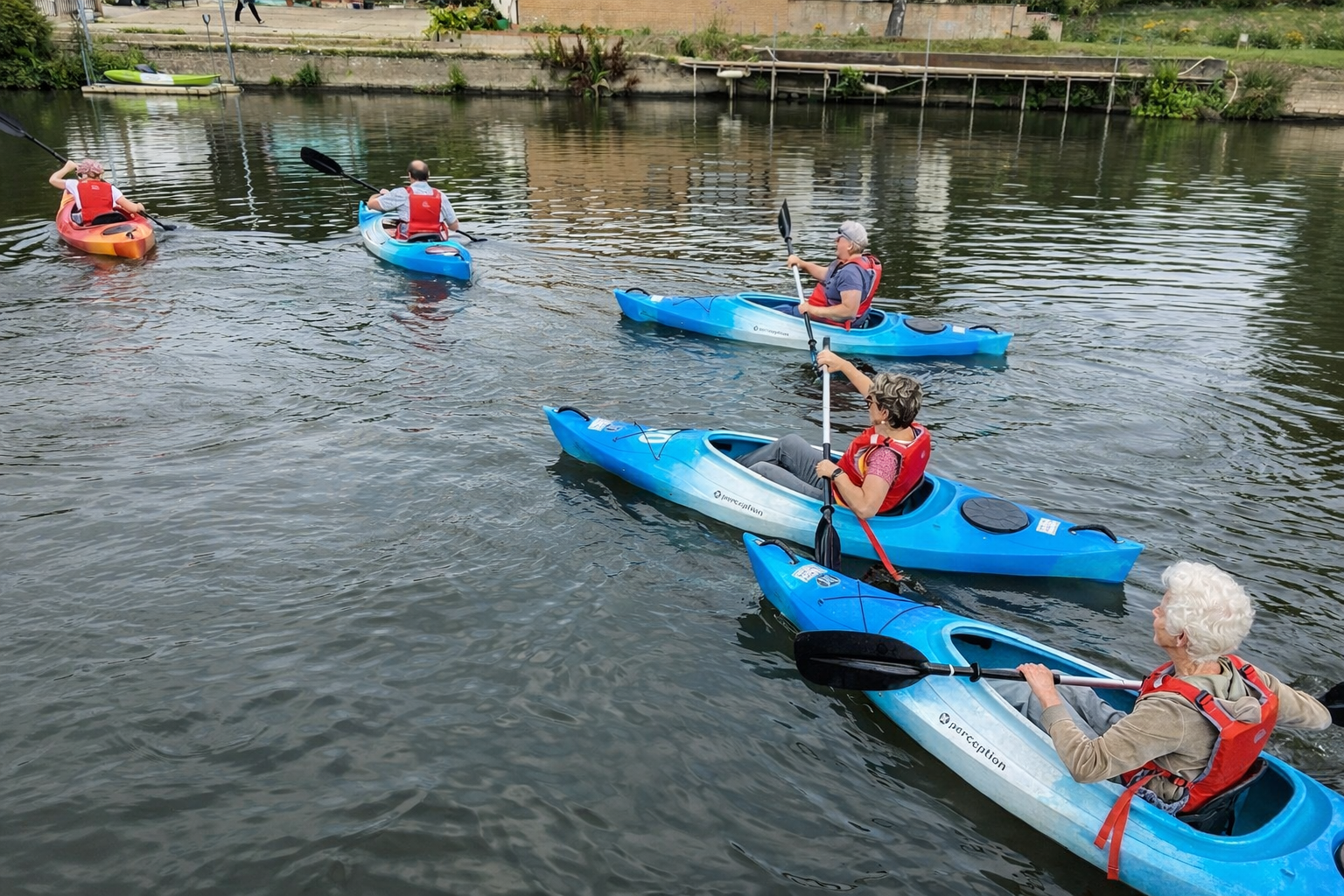 Kayakers on a peaceful urban waterway (1).png