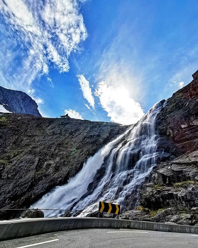 Waterfall are shining in the spring #thetravelinspector #travellersagainstracism #ilovetheriver #trollstigen #stigfossen