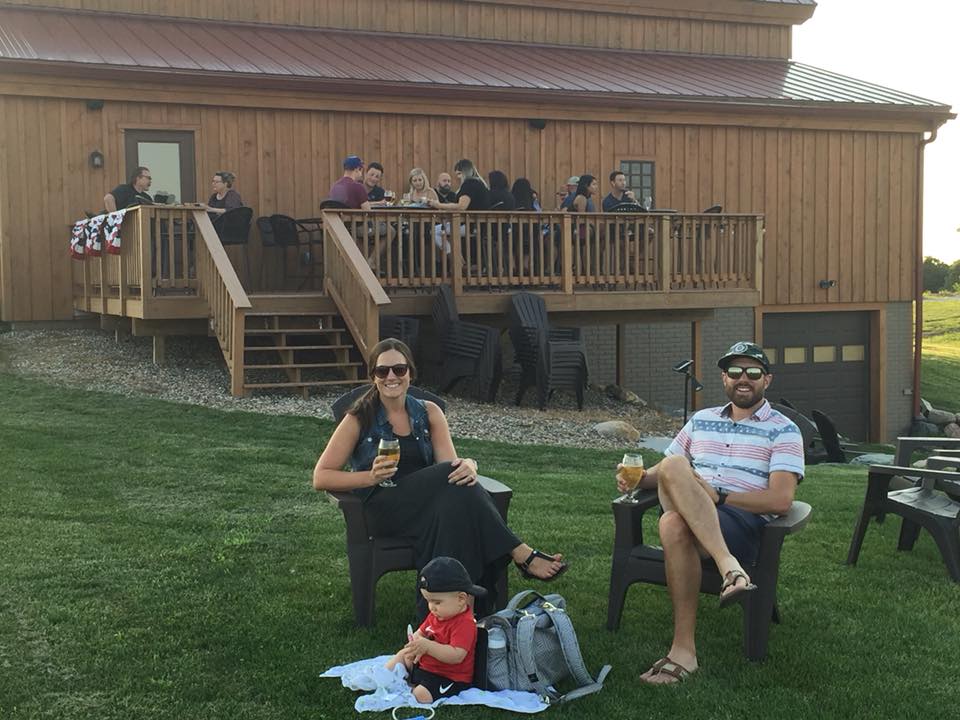 couple and kid in yard.jpg
