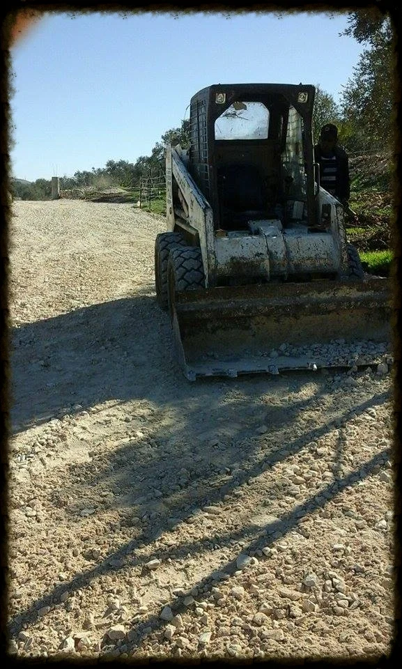 Bulldozer Leveling the Gravel