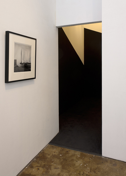  Installation view,&nbsp; Black Site Analogue, 1,623 Cubic Feet,  2011.&nbsp;carpet, paint, halogen lights.&nbsp;168 x 196 x 148 in.&nbsp;    
