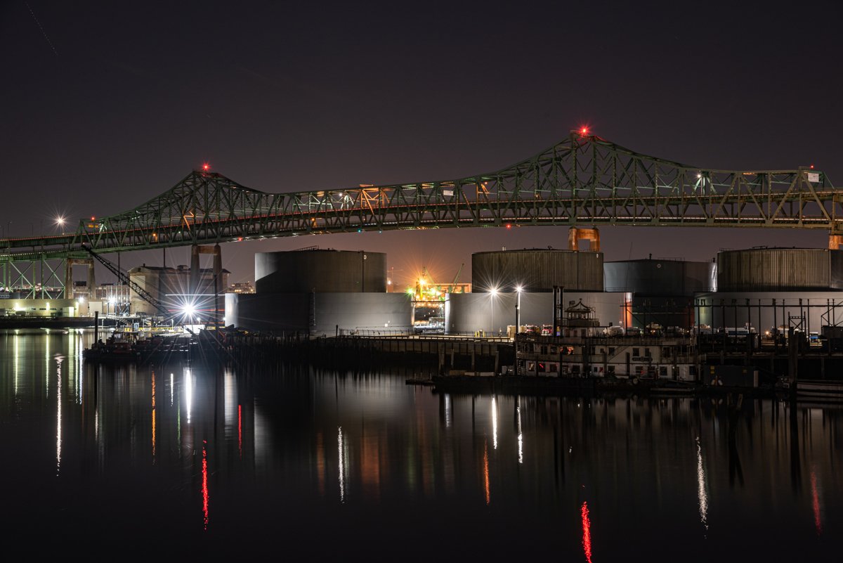  2.21.2022 | This nighttime view of Chelsea Creek highlights the concentration of industry and critical infrastructure in the coastal region of the Mystic River watershed. This year, the Resilient Mystic Collaborative (RMC) released the results of a 