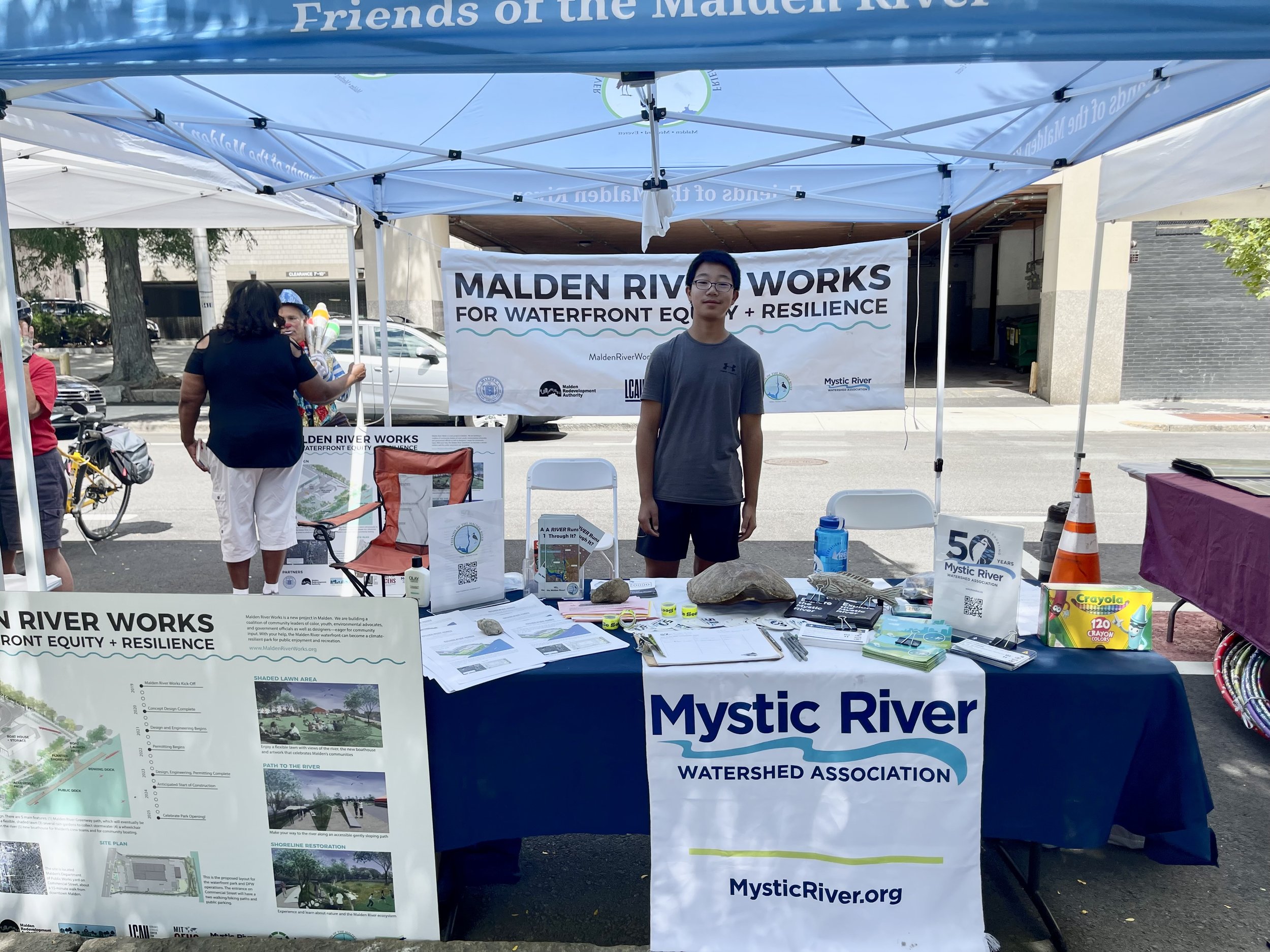  8.13.2022 | TianTong Wang, pictured here at the Malden Summer Festival, is part of our new  River Reps volunteer program  to help connect watershed communities to the Mystic River and our work at MyRWA. From his experience as a River Rep, TianTong s