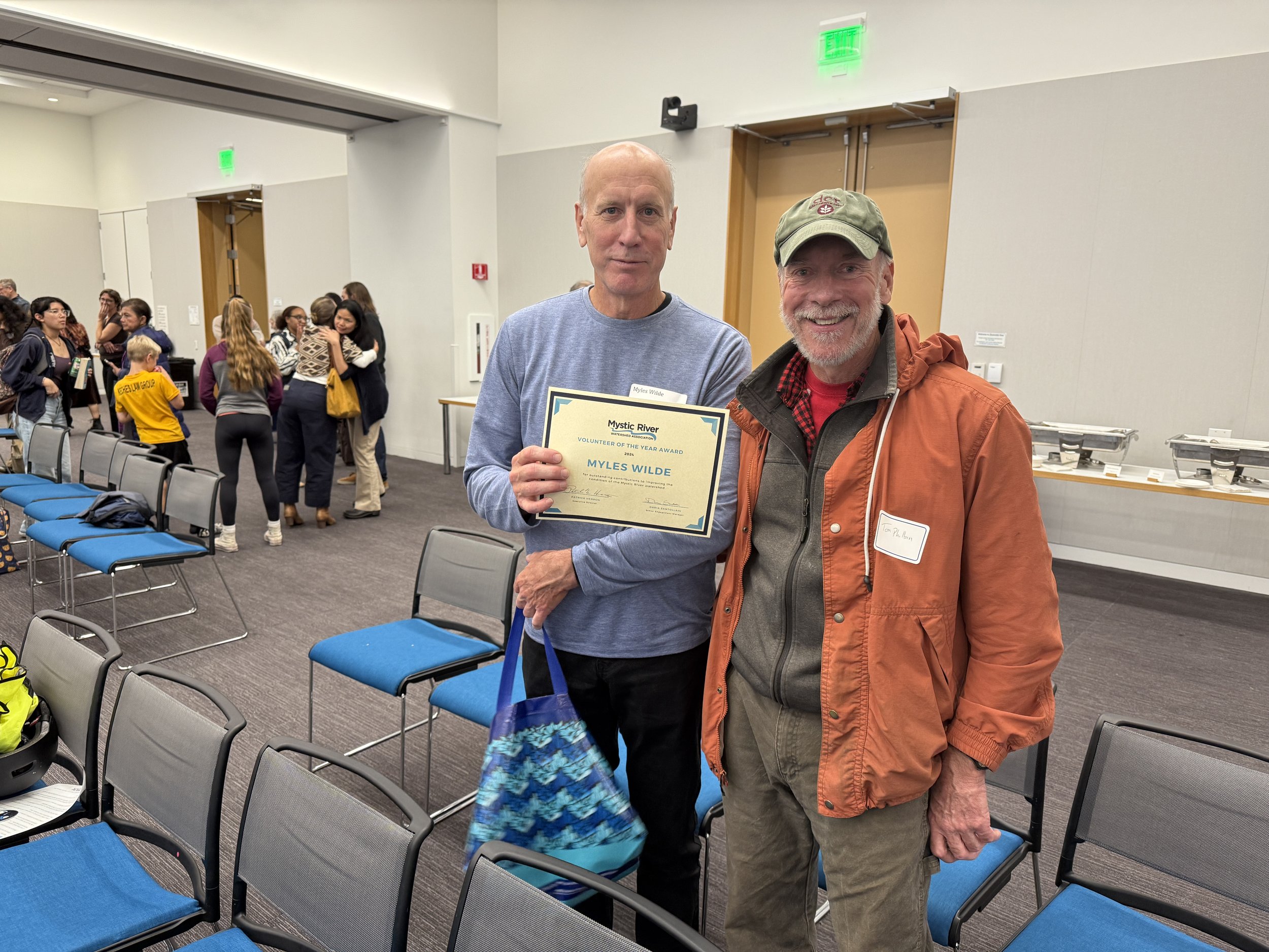  Our other 2024 Volunteer of the Year Myles Wilde with his award and Everett Conservation Agent Tom Philbin. Credit: Daria Santollani 