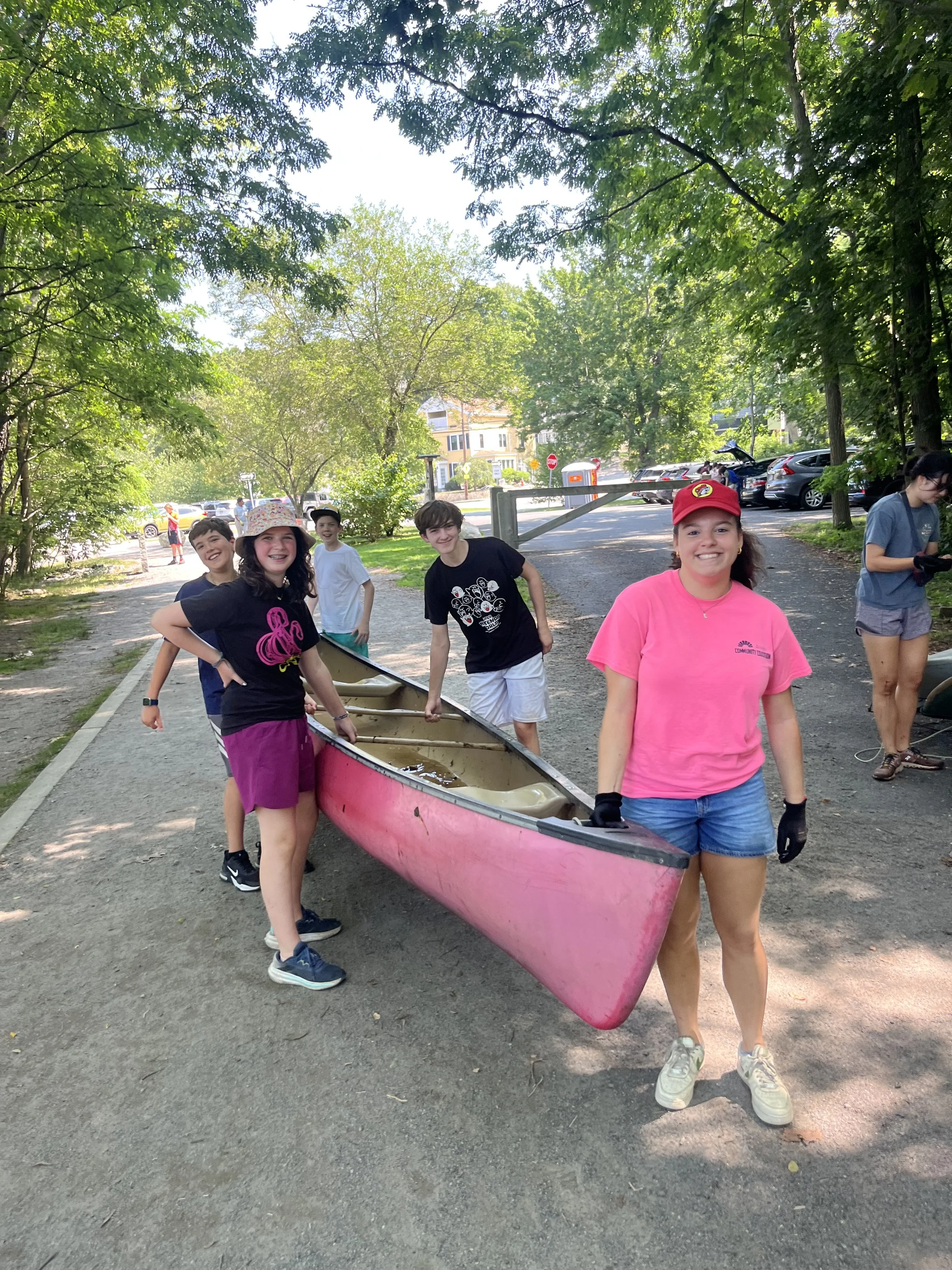 Biodiversity Builders &amp; EarthCore youth carrying a canoe at the Arlington Reservoir. PC: MyRWA Archives