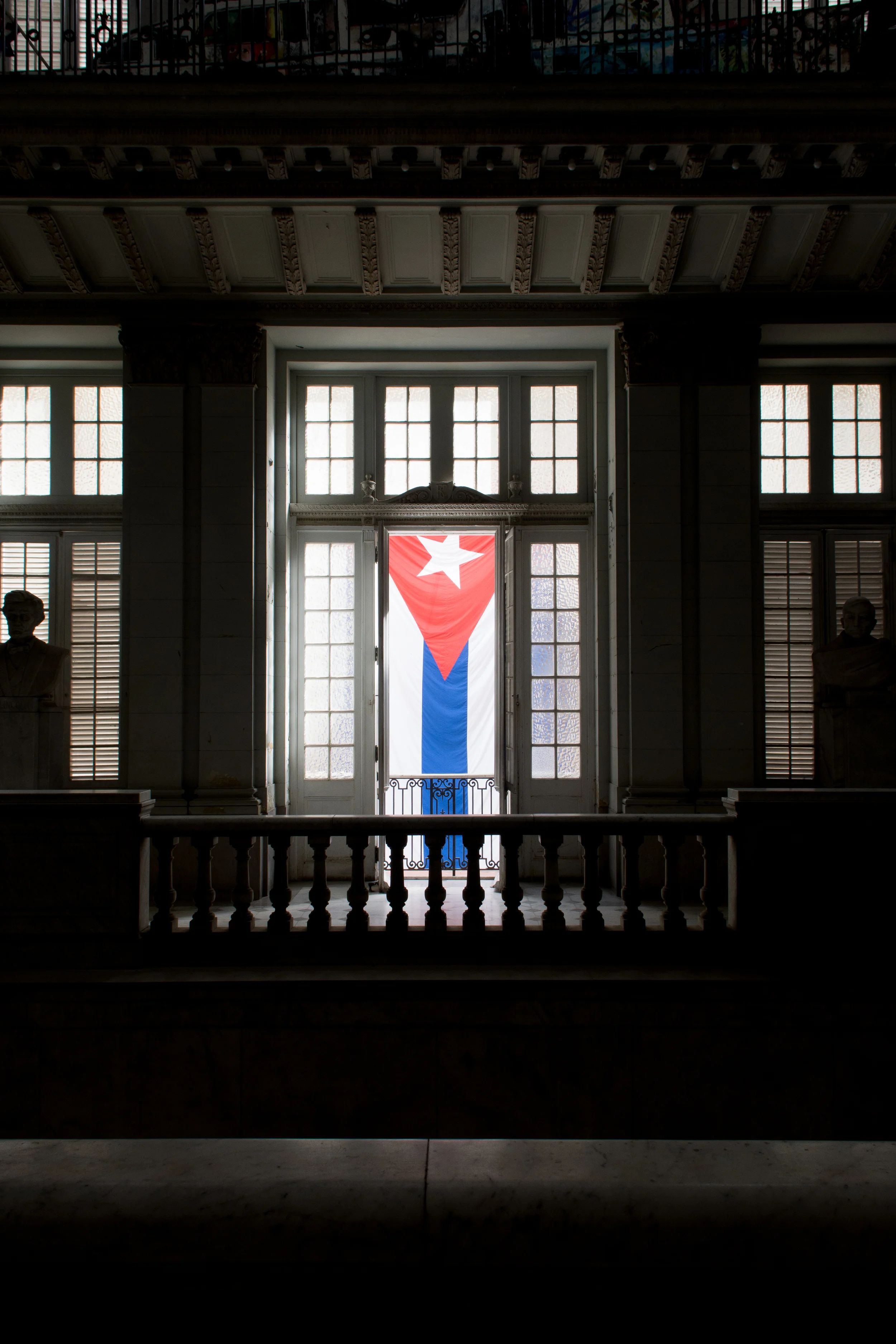 ISO 200 / 17mm / f7.1 / 1/100sec - Cuban flag hanging in the Museum of the Revolution. The building used to be the Presidential Palanace before it was stormed by the Fidel and his guys. 