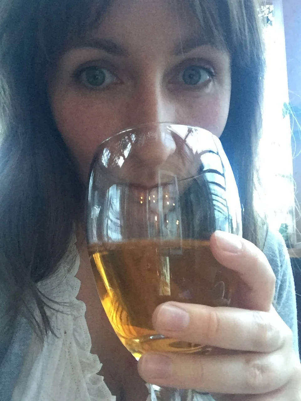 A recent photo of me, sneaking away from it all with a glass of wine. Ahh, heaven. 