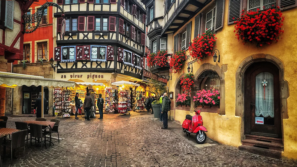 Colmar, half-timbered buildings in paint-box colours line cobblestone streets to the delight of tourists.