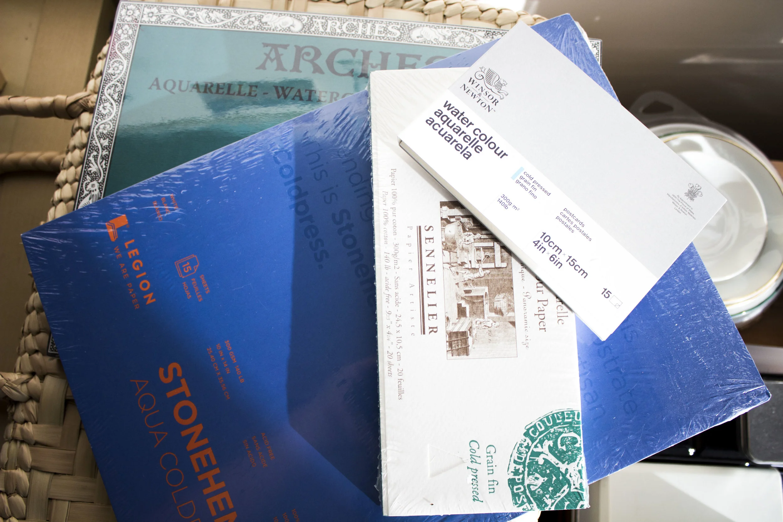 Different brands of paper that works well with watercolor.