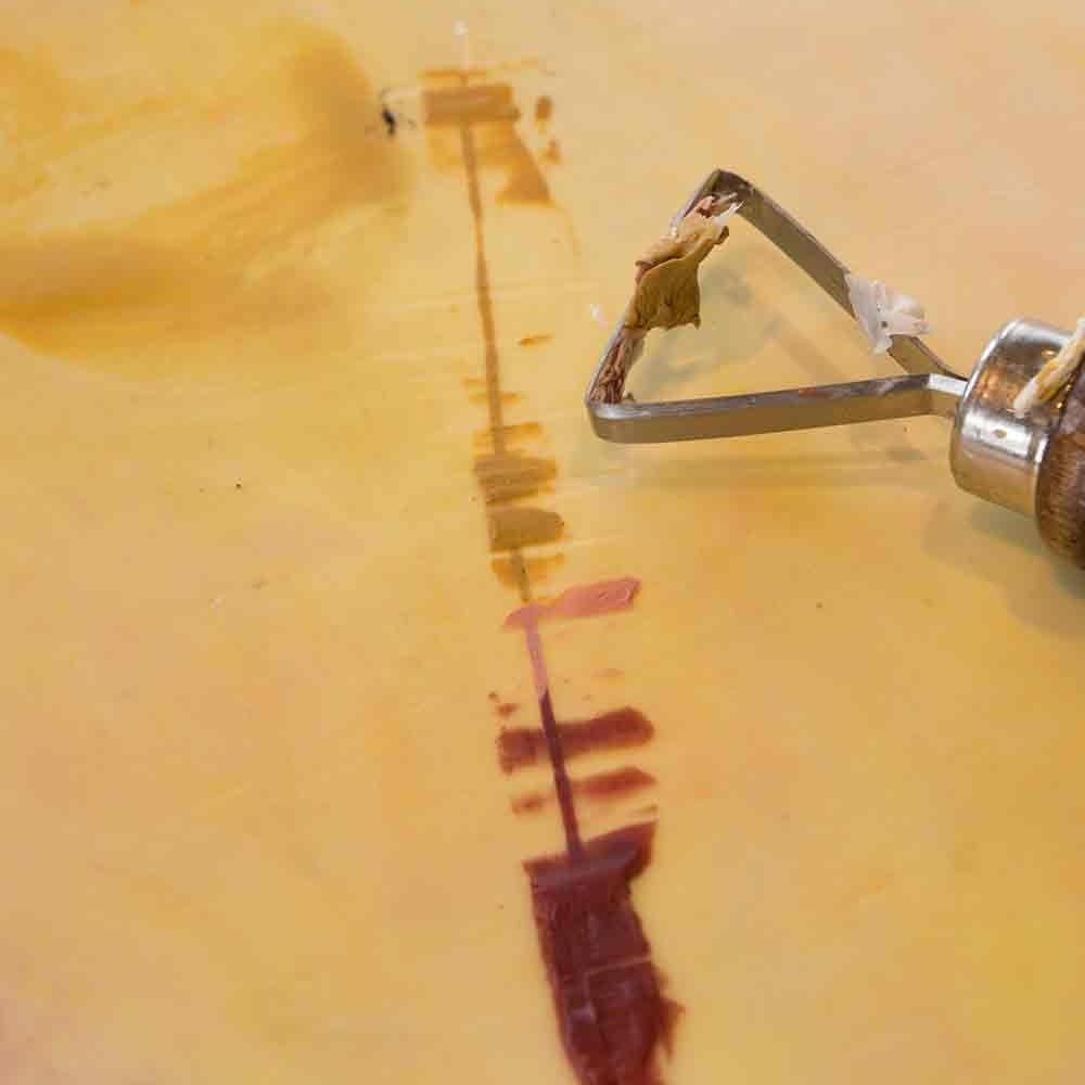 Filling incisions with wax