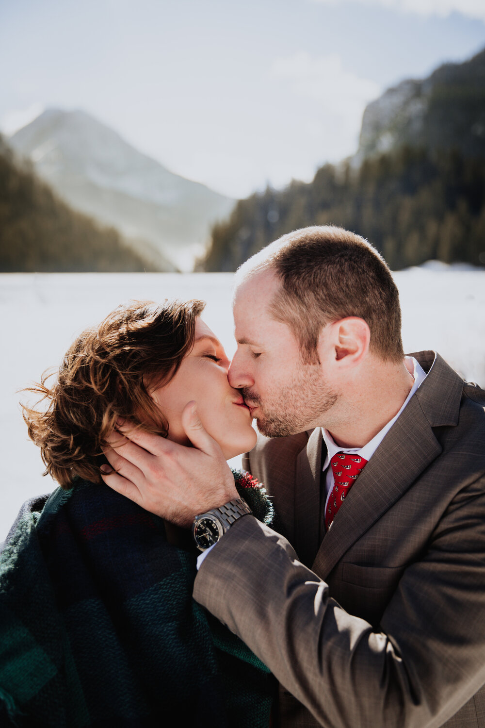 bride-and-groom-kissing-mount-timanogos.jpg
