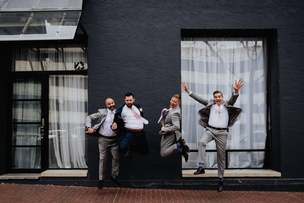 groom and groomsmen silly jump photo.jpg