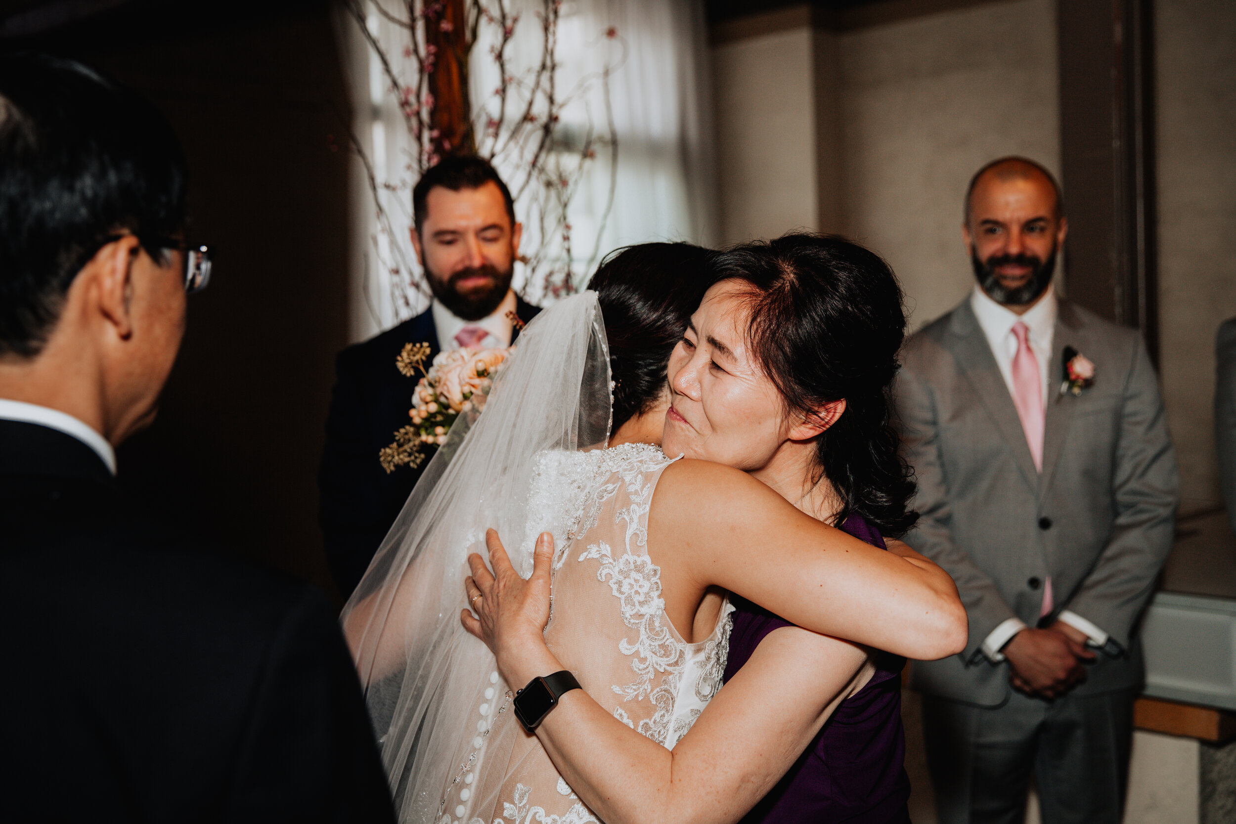 bride and mom hugging.jpg