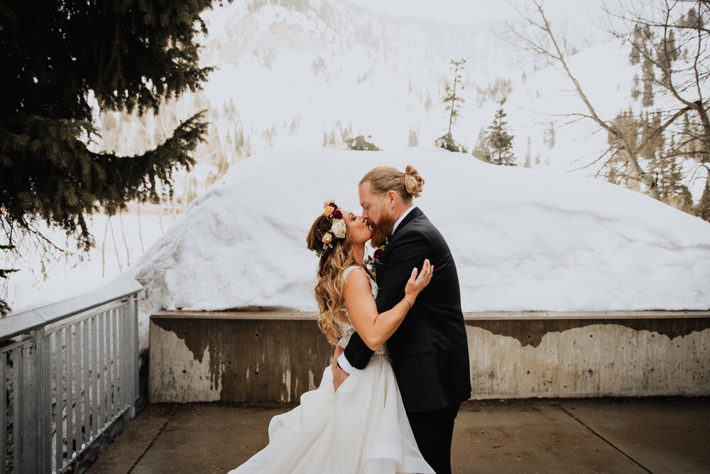 bride and groom kiss winter.jpg