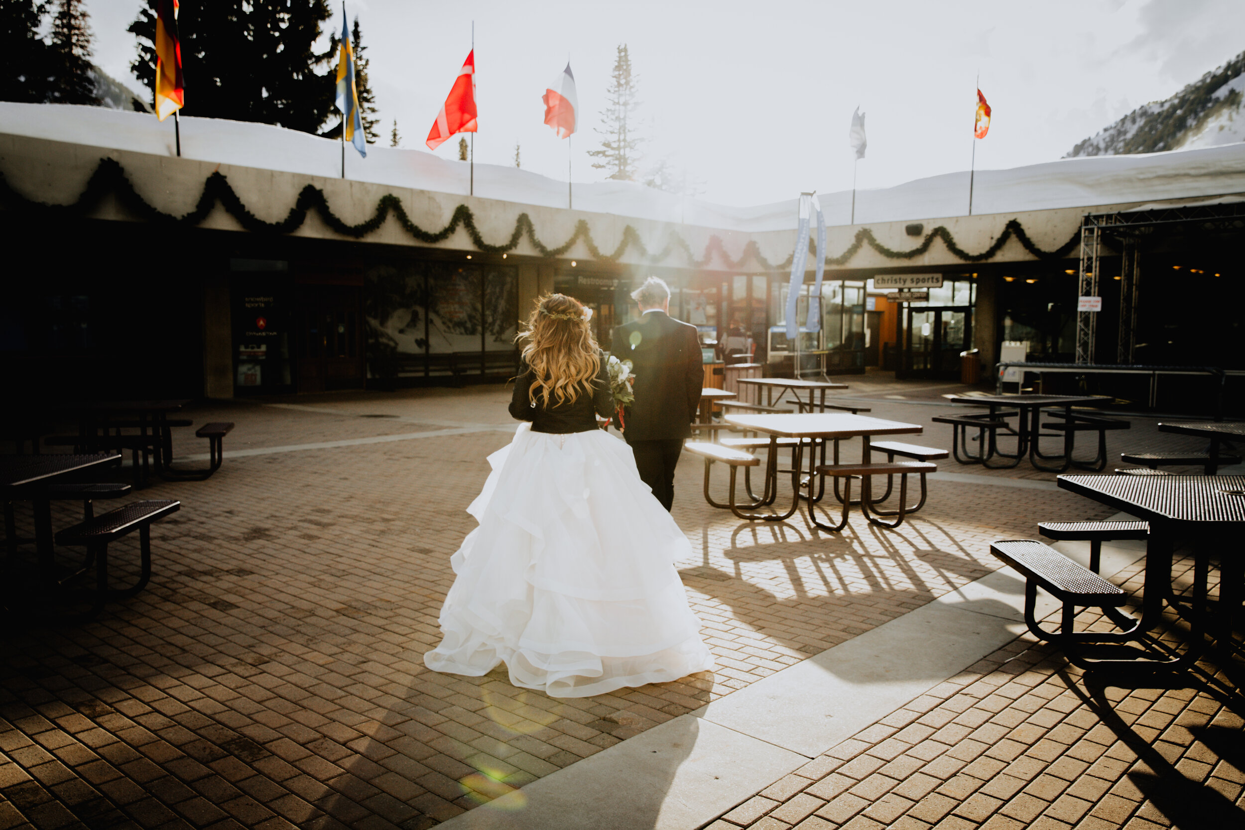 bride and groom walking around snowbird resort.jpg
