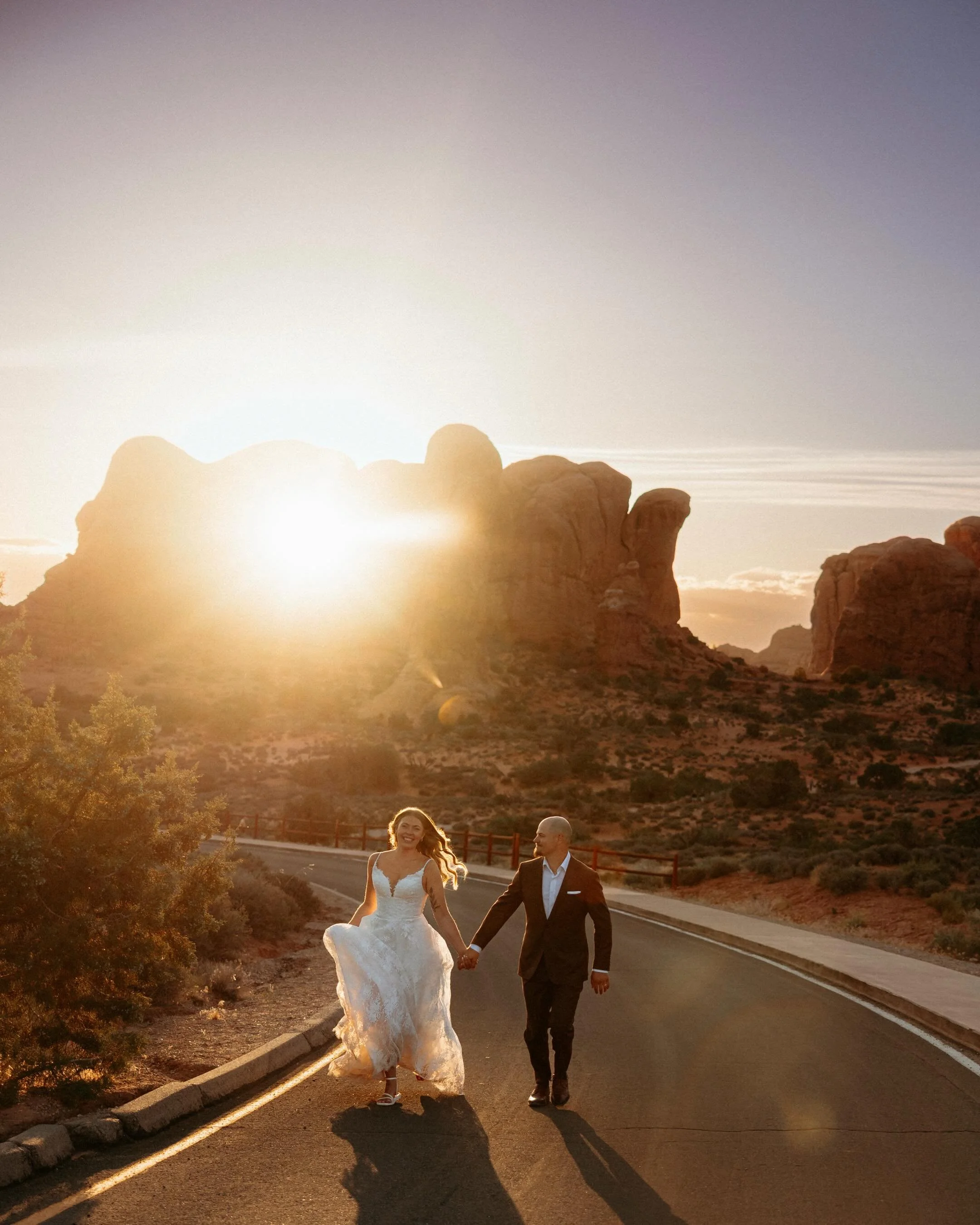 Autumn &amp; Milo in Moab ✨

The most perfect red rock adventure with these cuties. It was nearly 100 degree weather and these two handled the heat like champs and hiked in their wedding attire like it was nothing 😎 

#utahelopementphotographer #uta