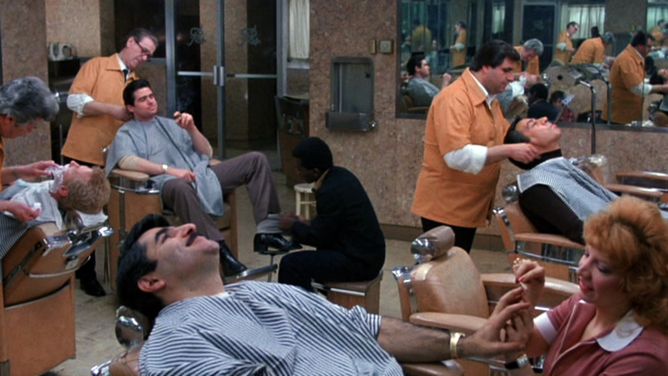 The SIU team celebrate with money they've skimmed from the day's big bust