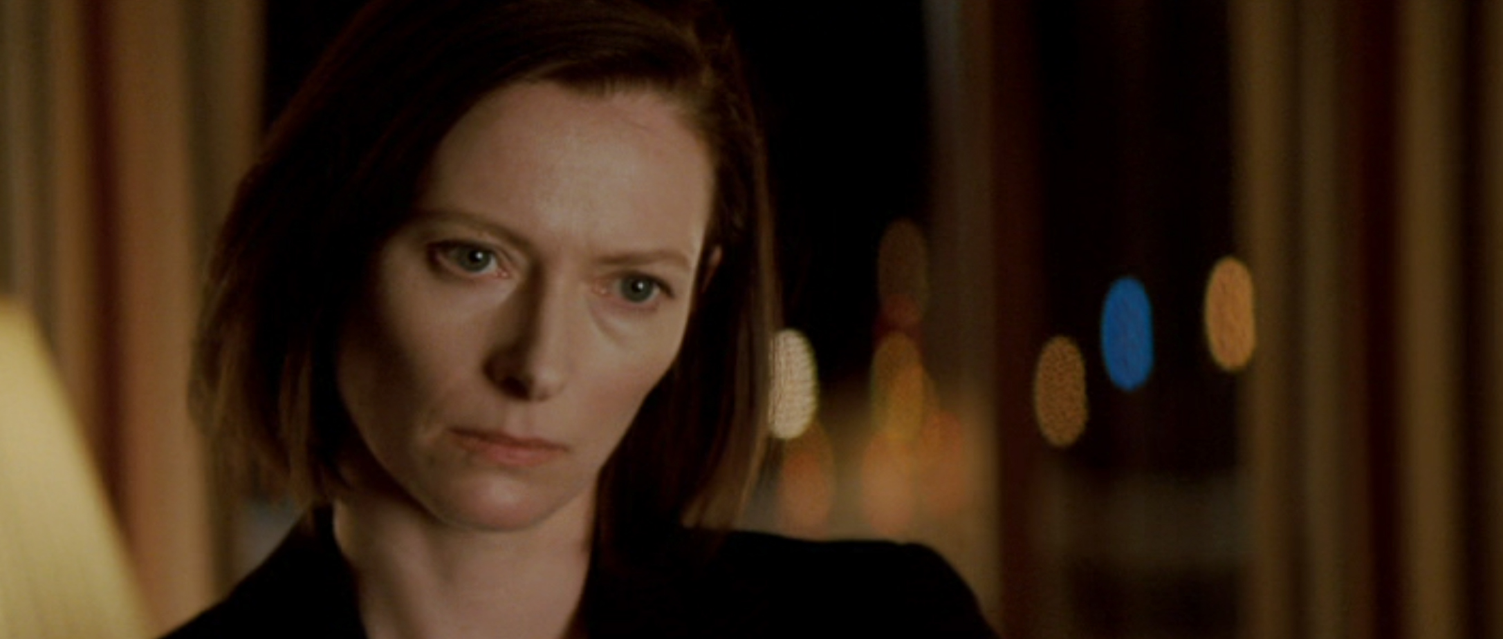Karen (Swinton) decides how far she'll go to protect her company