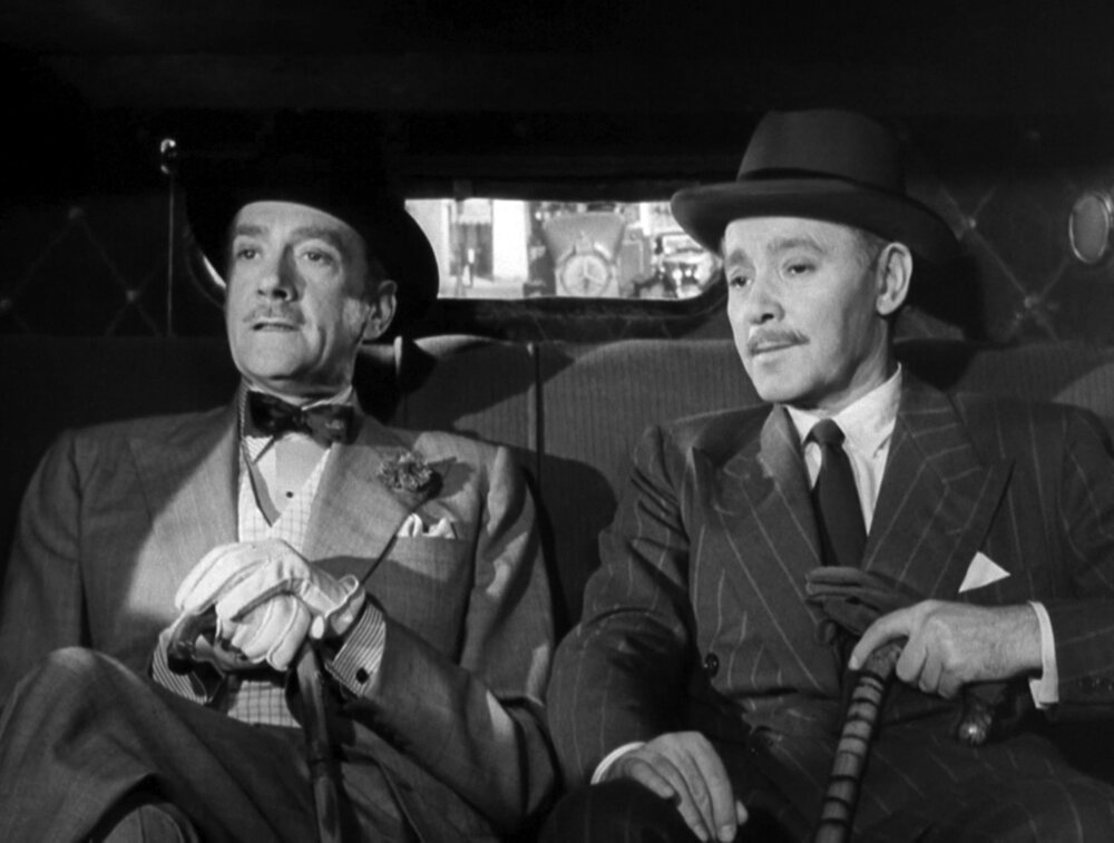 Clifton Webb and Herbert Marshall in The Razor's Edge