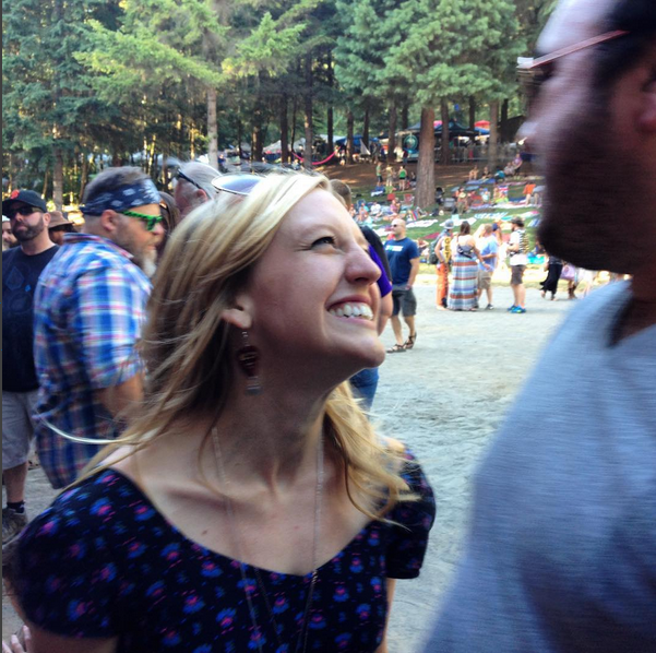 Her smile is contagious. I'll bet you're smiling just looking at this photo. :)