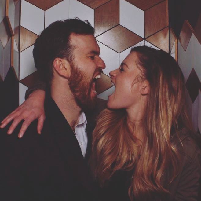 Ashley and Zach checking each other for tonsillitis. You can never be too careful.