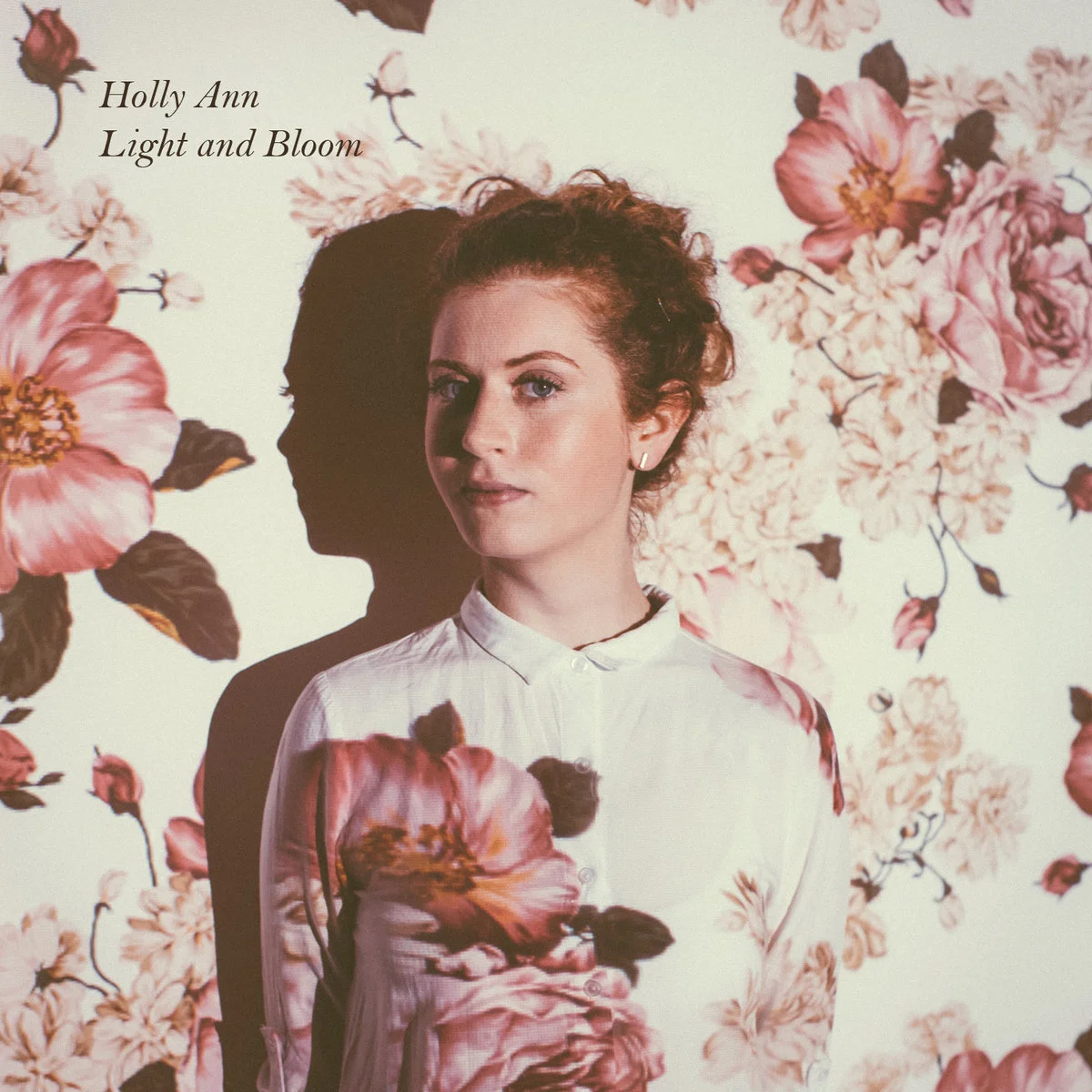 Holly's latest album, Light and Bloom, which is INCREDIBLE. And you can download it here . :)