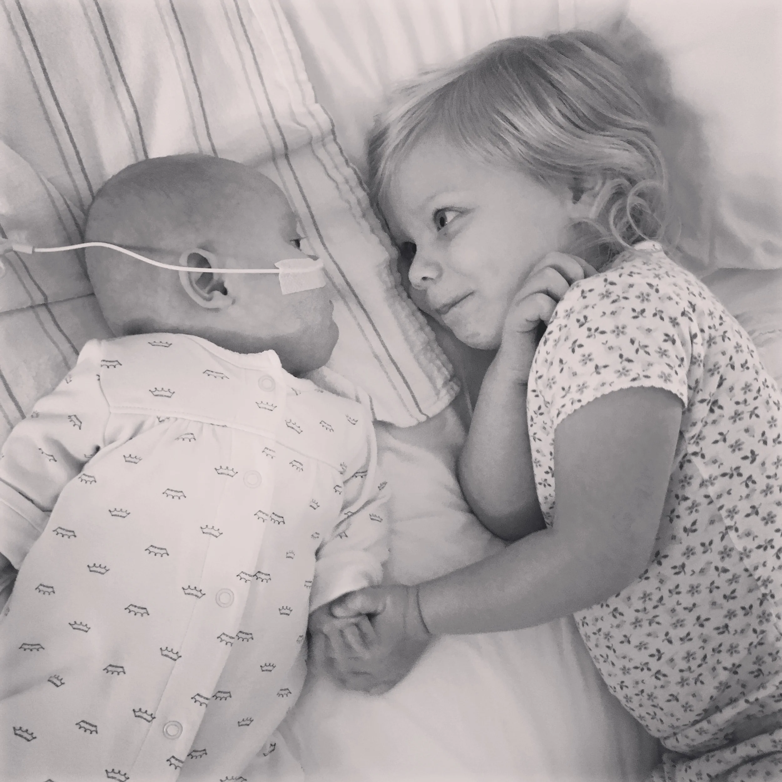 sisters holding hands.