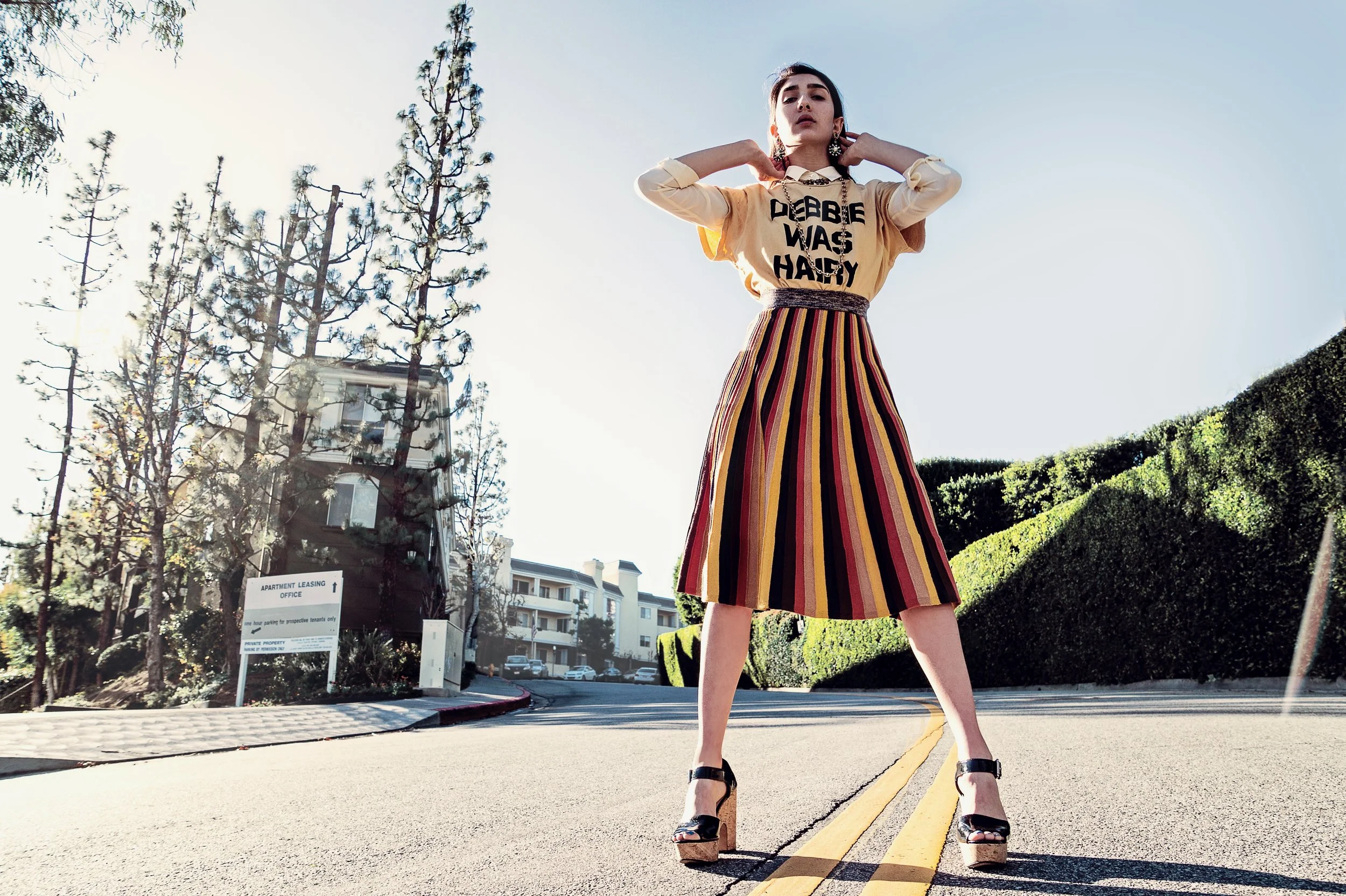 Nadia Shajari in Madeworn, Ottod'ame, Equipment and Erickson Beamon. Shot by Sydney Easton for TAGS.