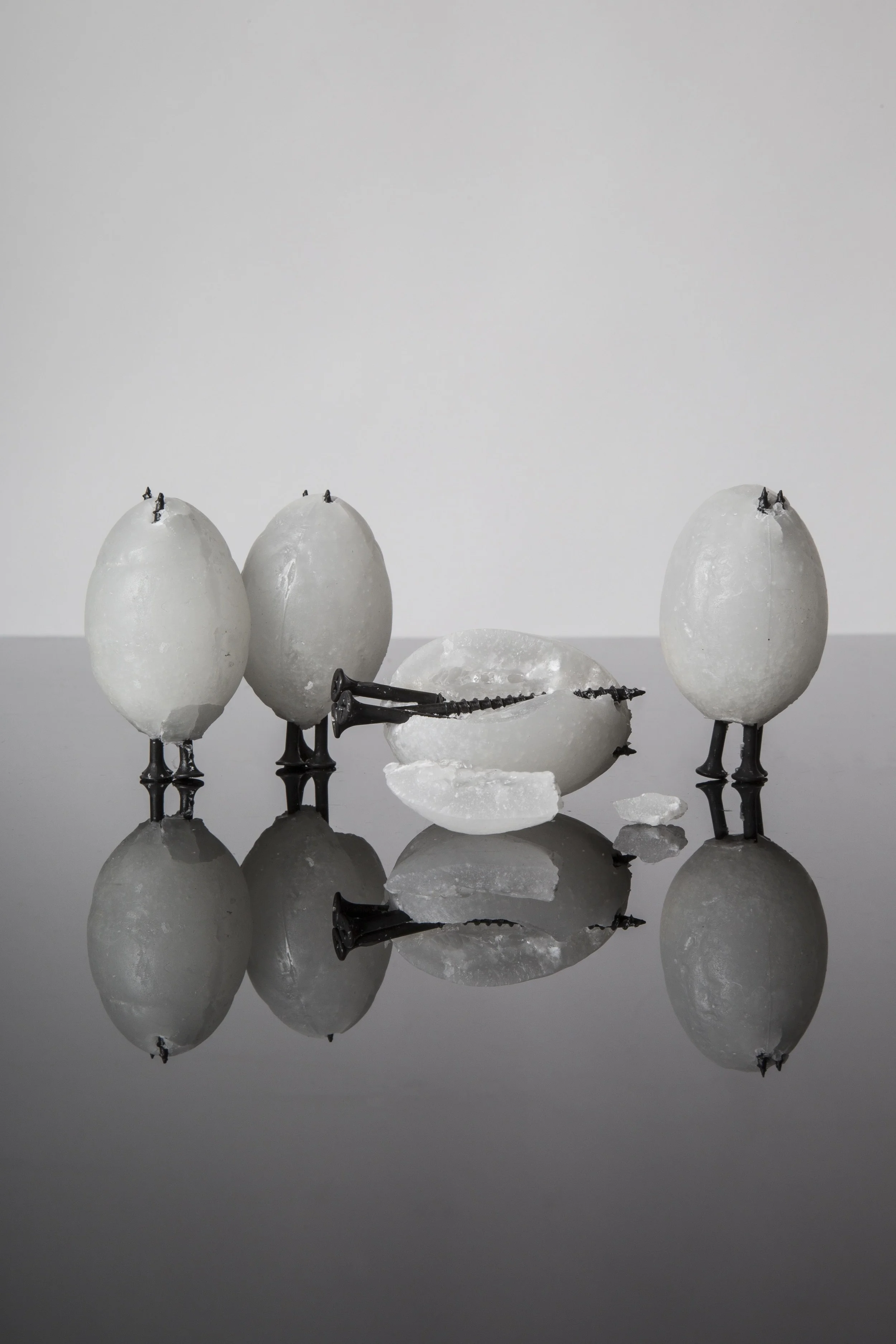 Screw Eggs by Thomas Flynn II, 2016, each 1.75” x 1.75” x 3.5”, wax and screws