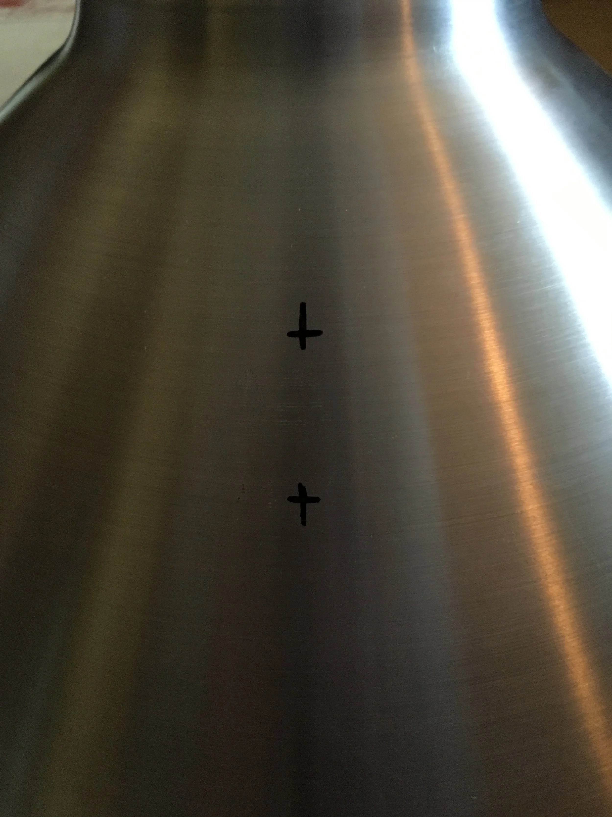 Vello mounting bracket marks. See the above image if you're looking for clarification on the Vello mounting as compared to the speedlight hole. 