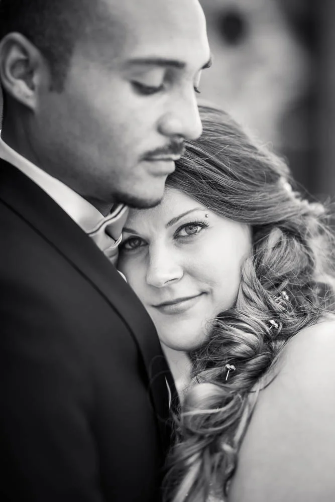 A black and white portrait of a bride and groom in Tower Grove Park in St. Louis.