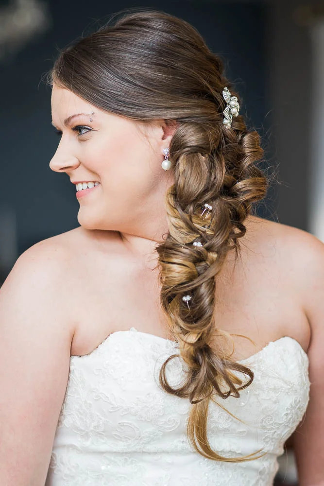 A portrait of a bride while getting ready for her wedding. Photograph taken in St. Louis, Missouri. 
