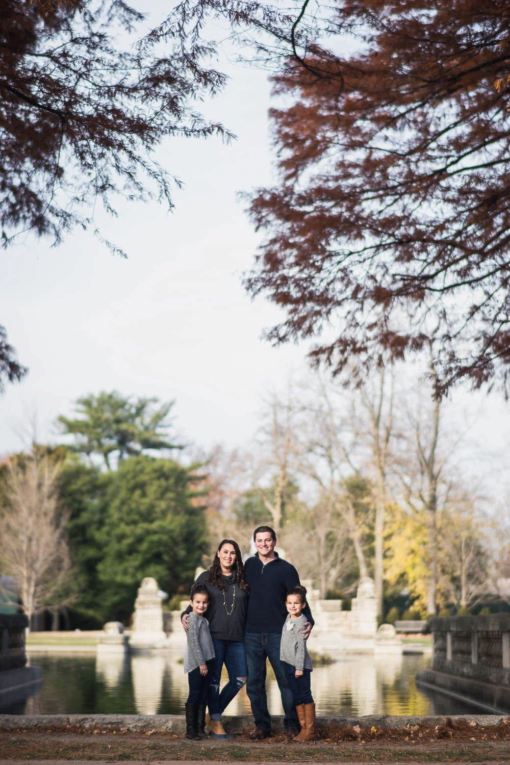 A portrait of a family at Tower Grove Park. 