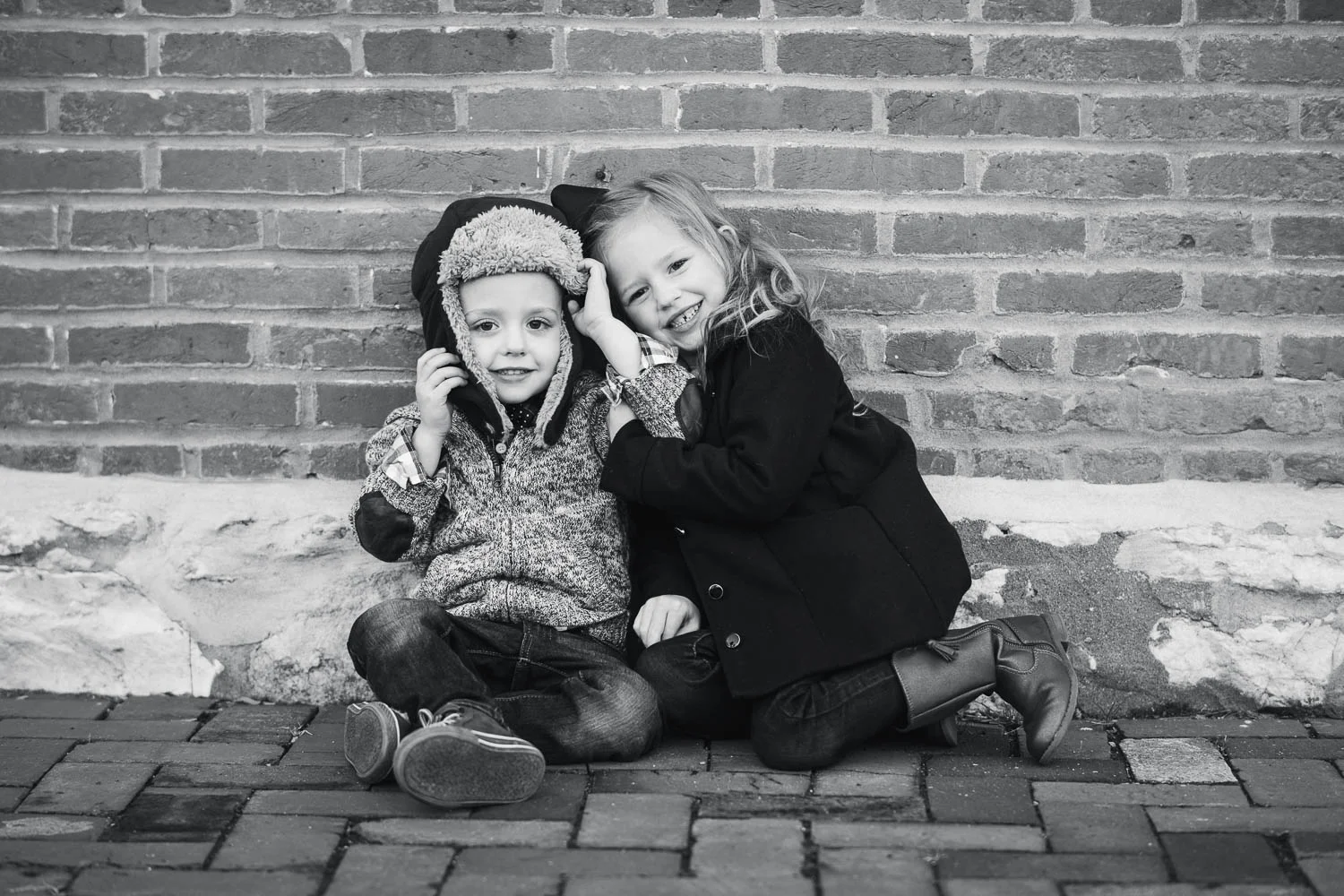 Children pose during their family photography session in St. Charles, Missouri. 