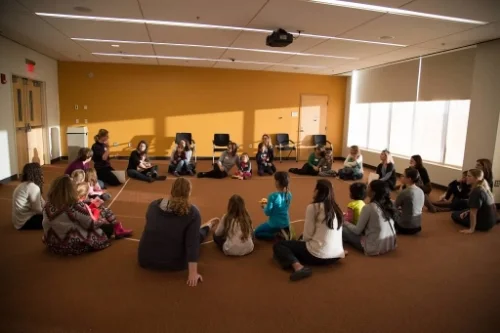 After each main activity, the whole group gathers together to reflect on mom-daughter teamwork and communication