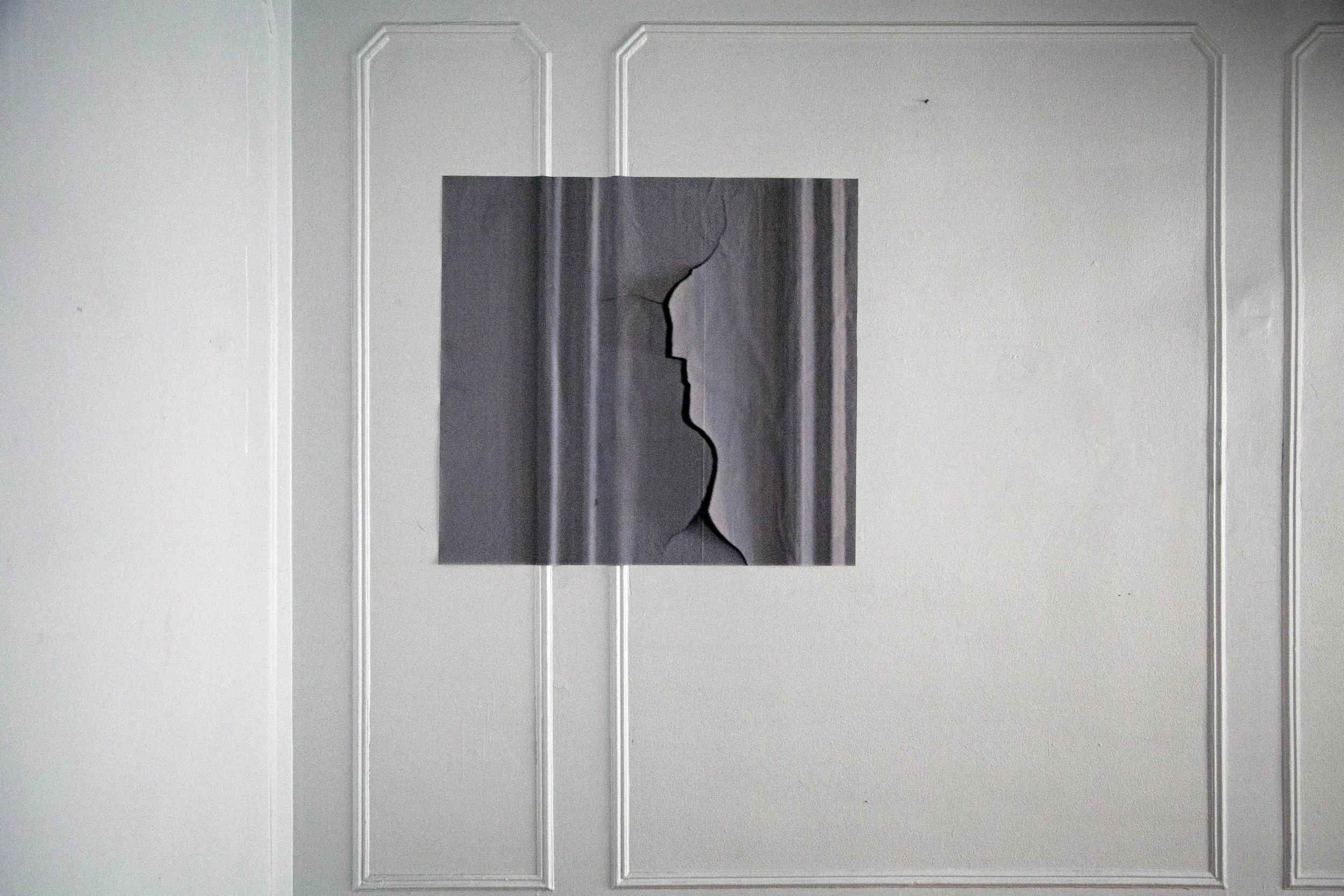 Artworks in the form of projections, prints, and small interventions were placed throughout the three spaces. These were repetitions of architectural flaws (the print of a crack in my apartment placed in the approximate same location in the other two units), patterns in rugs and chairs turned into 'blinds', and projections of objects that had particular significance taking on larger-than-life proportions, if I or the other tenants felt they had significance and memory.